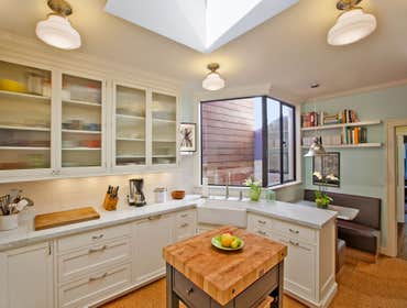 21st Street Residence Working with a long time resident, creating a unified look out of the varied styles found in the space while increasing the size 