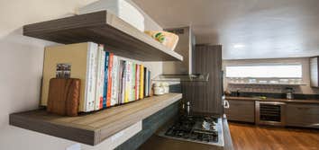Project photos from Artifex Industries Inc. Whole home remodel: bedroom, kitchen, bathroom, living spaces.