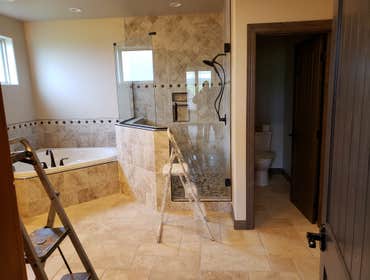 Photos by North Country Construction Inc #1 We built this gorgeous 5,000 SF house for a client in the powderhorn. It has a attached 3 car garage on a n