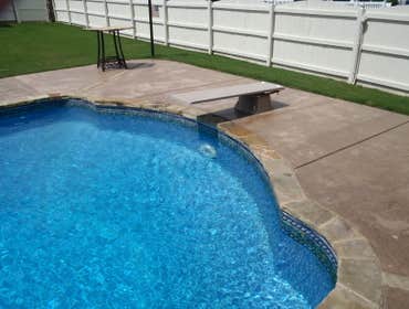 Clearwater Pools18x37 Roman swimming Pool in Harvest, AL 18x37 Roman with custom cast coping and custom steps.