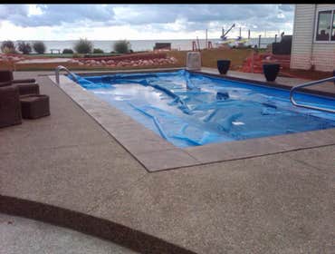 Exposed Aggregate Pool Decks photo, by Potoroka Concrete