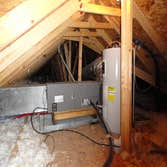 Project photos from Echols Home Inspections Old Knob n Tube wiring.
Damaged Electrical Panel
Slight Water Intrusion
Beer Can Hot Water Heater Flue (N