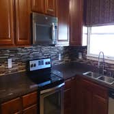Project photos from perfection tile and stone Interior remodeling of kitchen and baths. Custom backsplash,floors,walk in showers,and tub surrounds.