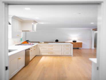 Photos by Albrecht, LLC #1 Through strategic space planning, thoughtful material selections, and custom craftsmanship, this first-floor renovation tran