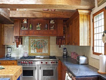Tewksbury Horse Farm Kitchen This period style kitchen on a vintage horse farm was meticulously built utilizing a combination of tiger maple, cherry wo