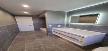 BATHROOMS Transform Your Bathroom Oasis: Experience the luxury and comfort you deserve with our expert bathroom renovation services.