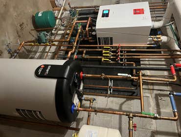 Photos by Stellitano Heating and Air Conditioning, Inc #26 Triangle Tube boiler installation