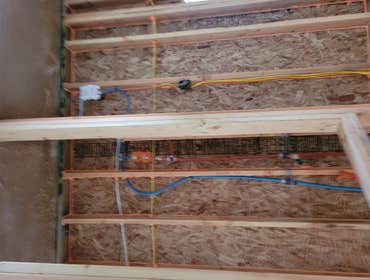 Photos by Top of the West Plumbing #2 5 bathroom, 2 kitchen, 2 laundry rooms. Hydronic floor heating throughout.