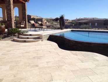 Reverse negative edge Travertine deck, spa, reverse negative edge play pool,