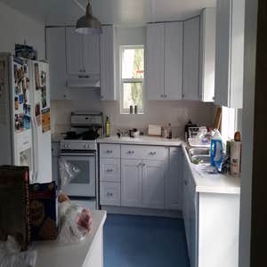 Kitchen Remodel in Dunn barn. Floor was 2-3/4" out of level in 12 feet, required a custom leveling using Ardex K-15 self leveling polymer...