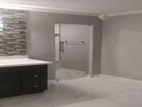 Photos by Top Notch Construction, LLC #1 Demolition for primary bathroom, enlarge door (handicap accessible), remove closet to increase space, install 