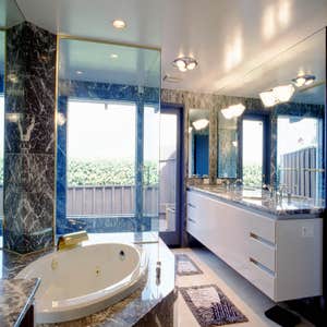 1994: Mountain Marble Master Bath In this bathroom we completely redesigned the tub and shower area while doing only cosmetic changes in the other...