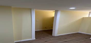 Photos by Your Expendable Services LLC #1 Basement remodeling project completed with new framework, walls placed and painted. New recess lights and LPV
