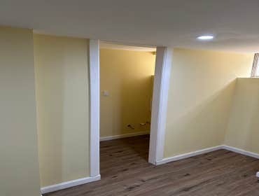 Photos by Your Expendable Services LLC #1 Basement remodeling project completed with new framework, walls placed and painted. New recess lights and LPV