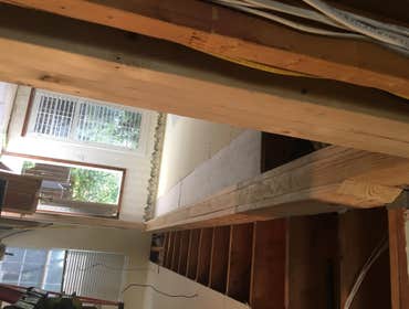 Carpentry - Beams Removed wall between kitchen and living room and install hidden support beam.