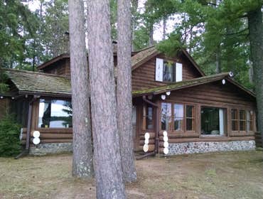 Showcase Roofing and Log Home Restoration This is a total restoration of a Log Home Estate built in 1931. The extensive log work came out beautiful as 