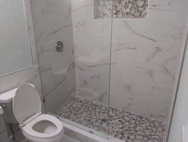 Bathroom Remodels Bathroom expanded. Toilet moved 2ft. New shower