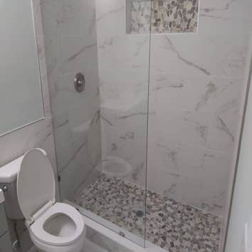 Bathroom Remodels Bathroom expanded. Toilet moved 2ft. New shower