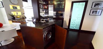 Kitchen and Livingroom remodl by Elite Architectural Remodeling Co Complete remodel with custom cabinets, shelves, doors. All woodwork designed and cre