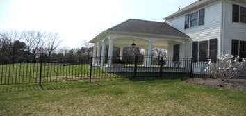 Sentinal black aluminum in Malvern This is a beautiful 54 inch black aluminum fence with swing out self closing estate gates with magnetic latches. Al