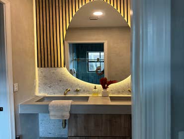 Photos by Ark Concept & Construction Inc #1 Residential bathroom remodel combining the timeless appeal of classic high-end materials with the raw, unfi