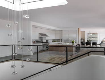Tiburon house Install hardwood flooring throughout house - wide plank white oak with cured urethane finish