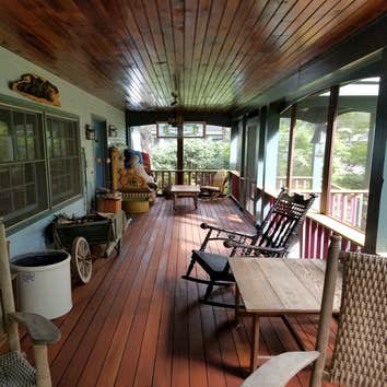 Photos by Lyman Design LLC #1 Restoration of rotted stairways and deck boards, including all new paint and stain.