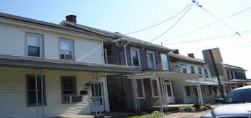 Swank Home Makeover A 2.5 story, single-family home: Siding, windows, insullation, soffit, fascia, capping. Also, repaired fence damage, installed new