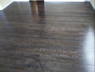 Grey Stained Red Oak Installed hardwood in a few rooms and refinishned existing hardwood to stain everything Graphite color.