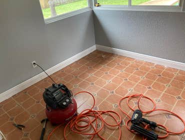 Orlando Fix 'n Flip Remodel/Update interior: new plank flooring throughout, full paint, new kitchen cabinets with granite counter and backsplash, hall 