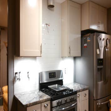 Vail Rd. Kitchen Backslash A delightful subway tile installed in the Kitchen.