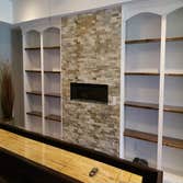 Basement Fireplace and Shelving