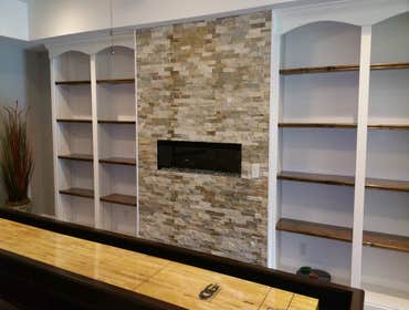 Basement Fireplace and Shelving
