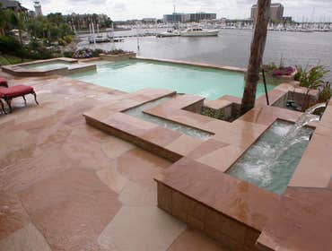 League City Swimming Pool Project This luxurious weekend home not only has a lake in its backyard, but a swimming pool too! The pool was elevated 8’ fr