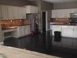 Albee Kitchen Remodel Kitchen cabinets refinishing, counter tops, under cabinet lighting and flooring