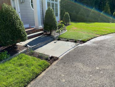 Wayland Hidden Springs Lane This is a new build construction where we did all of the masonry and hardscape work. Part of our scope was the fieldstone r