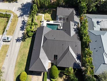 Photos by Gold Star Miami Corp #1 metal roof panels all are . 25 years warrantee