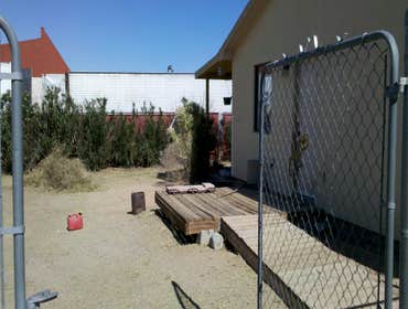 Thompson Pro Landscaping Project Simple clean up in Benson A.Z. It started as a one or two day clean up.From there stucco patch's on the house and demo