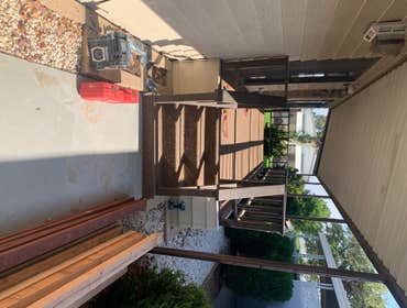 Photos by Saille's Construction #2 Steps going into porch were removed and replaced with a wheelchair ramp.