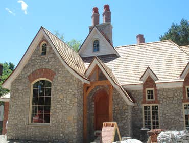 Super Custom Birmingham Home This project displays the "Best of the Best" in materials and mechanical systems. Custom sized machine cut cedar shake roo