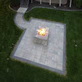 New Build Outdoor Living Package – Firepit & Patio Installation of a modern square gas firepit with integrated patio. Scope included compacted base pre