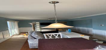 Photos by Flores Home Improvement LLC #1 Roof replacement paint wainscoting installation frame and drywall installation