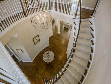GULICK | CUSTOM Home in McLean The impressive stone and HardiePlank® elevation on our Winthrop really stood out on this corner lot of approximately one