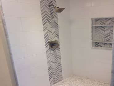 Quinn project in Cardiff, CA We did a contemporary project in Cardiff, CA which consisted of two custom contemporary bathrooms with showers and floors
