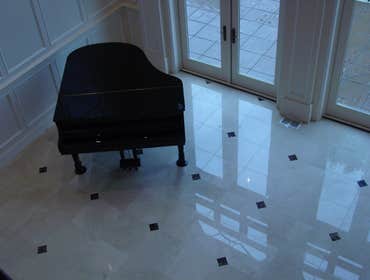 Photos by Jones Tile #2 18 x 18 crema marfil marble