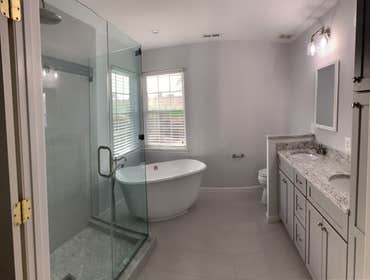 Bathroom Remodeling Gallery Step into the comfort of beautifully reimagined bathrooms crafted by Merrell Building Enterprise, Inc. Our gallery showcase