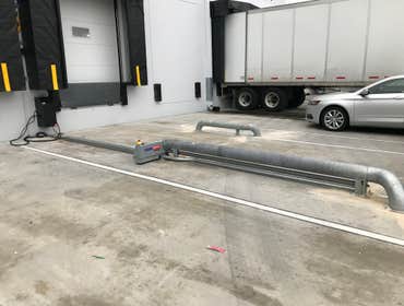 Photos by Amistad Contractors Group, LLC #1 40- Dock doors and dock levelers at new distribution facility.