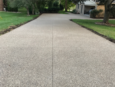 exposed aggregate Driveway Photo by Potoroka Concrete Macomb MI