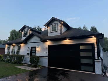 Photos by Lmlk Inc #1 Exterior architectural lighting installation completed for a residential property. Recessed LED fixtures were installed in the so