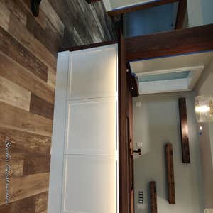 Photos by Scales Construction, LLC #7 Rewired 1800 sqft basement. Upgraded meter base to a 400 amp and installed additional 200 service panel.
